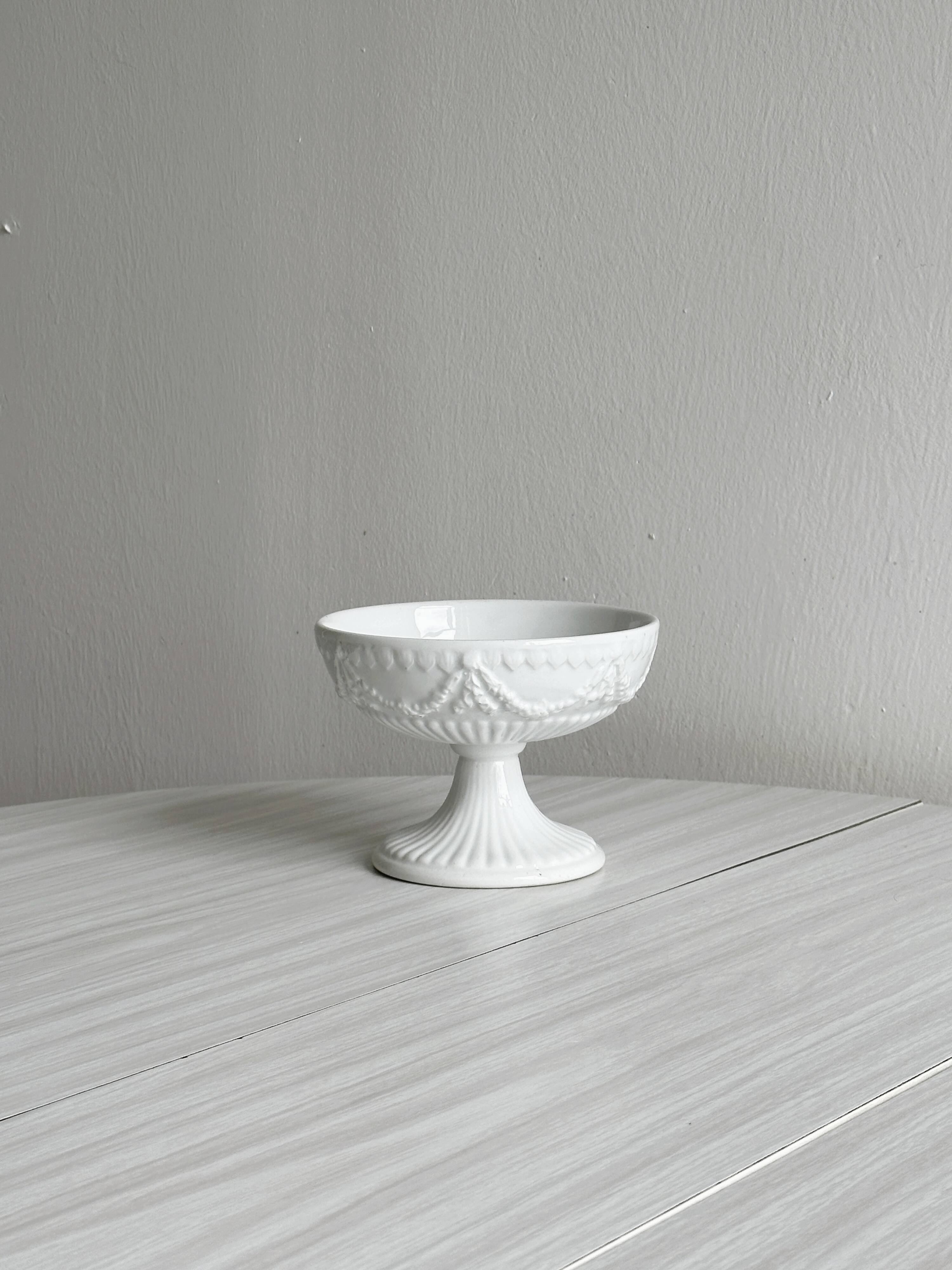 Decorated white porcelain cup