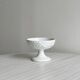 Decorated white porcelain cup