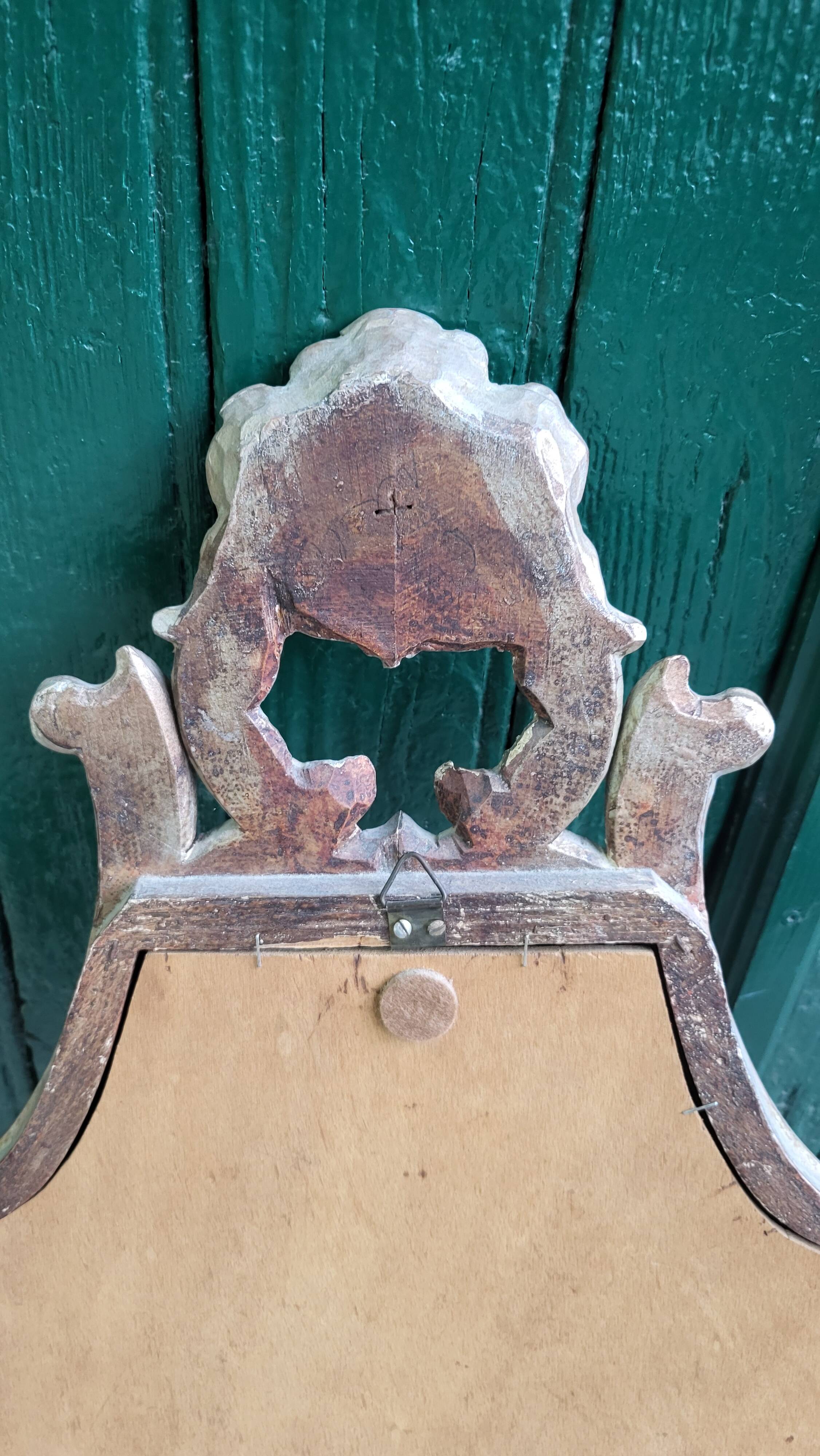 MIRROR IN LOUIS XV STYLE WITH GILDING AND SILVERING