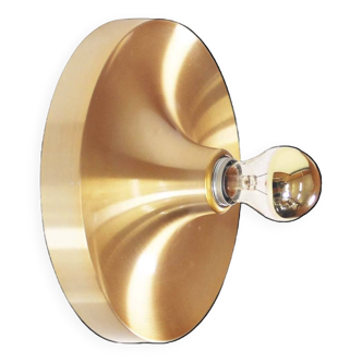 Champagne colored Honsel Disc sconce selected by Charlotte Perriand for Les Arcs