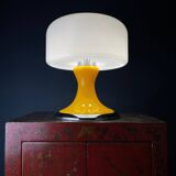 Mid-century Italian yellow table lamp from the 1970s.