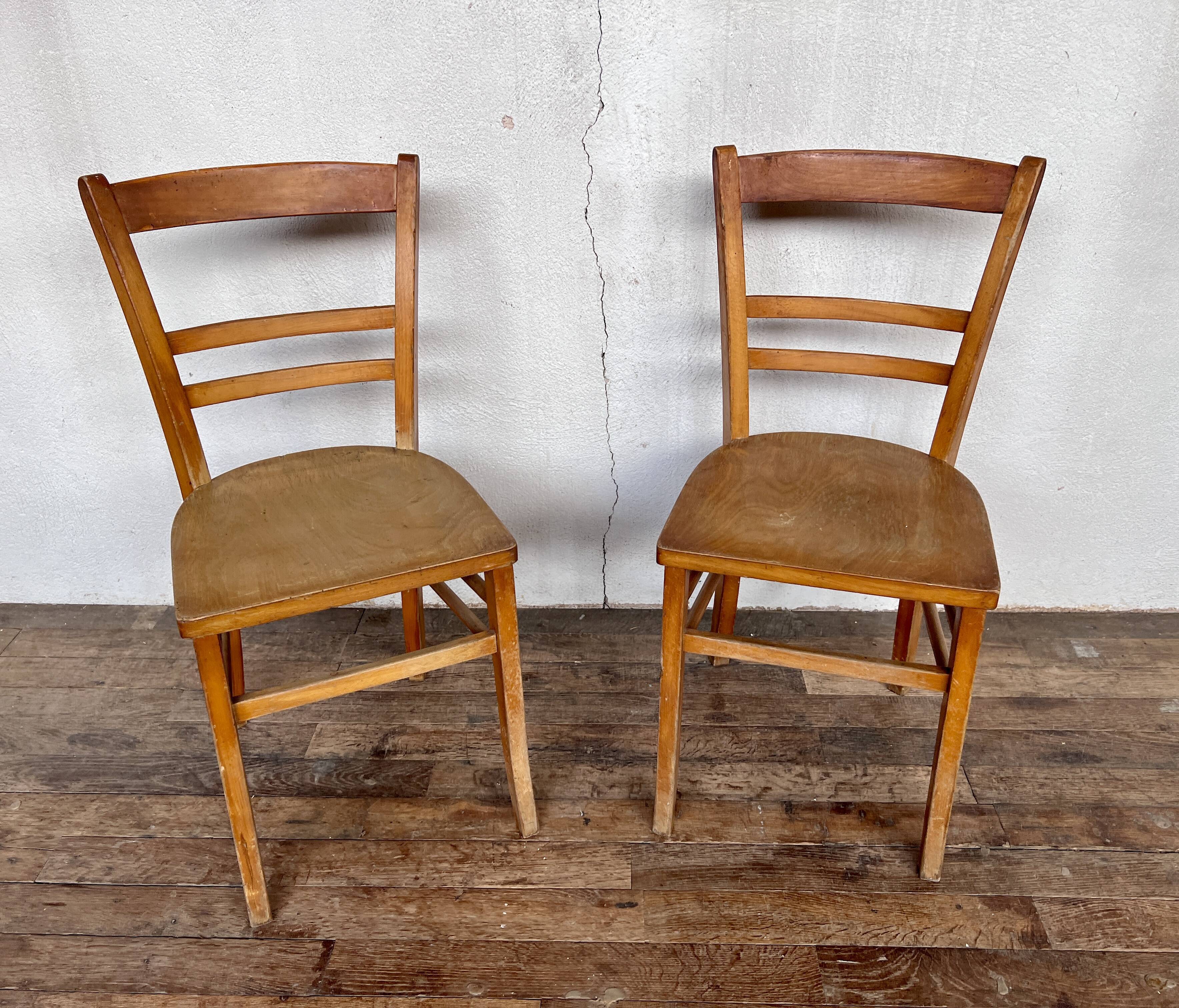 Pair of parisian wooden bistro chairs