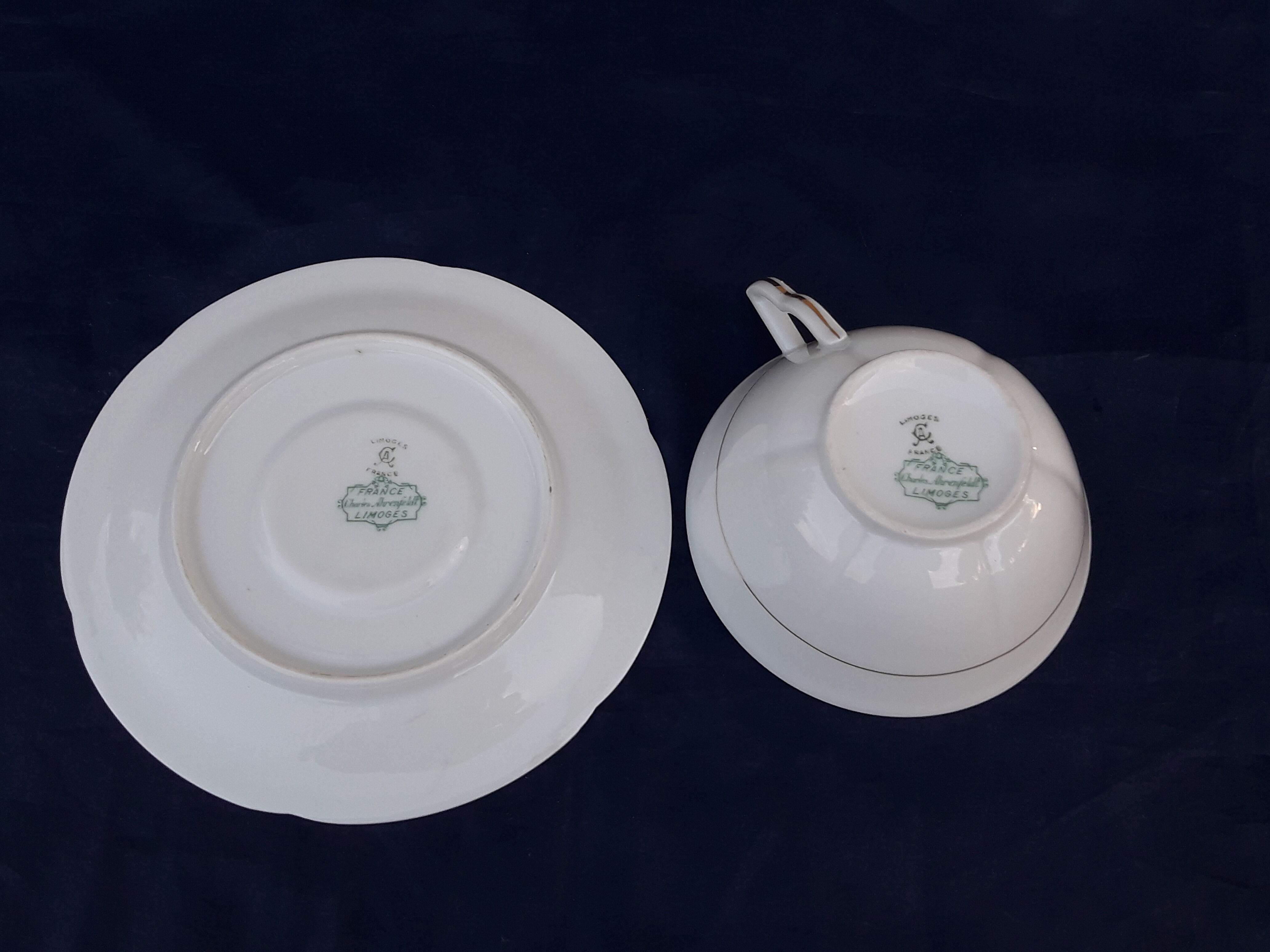 Tea cup with porcelain saucer from Limoges Charles Ahrenfeld bordered gilded