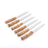 Six stainless steel knives with bamboo handles