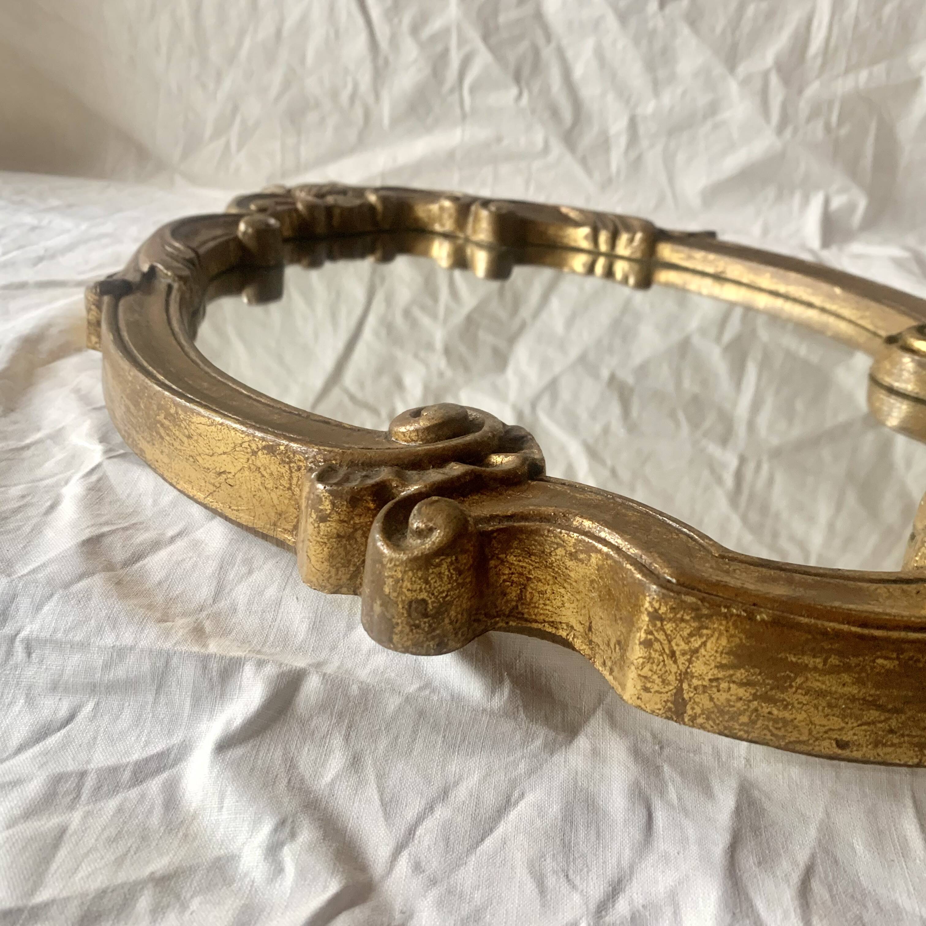 Vintage wall mirror in gold resin