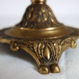 Pair of cherub candle holders in gilded bronze, early 20th century.