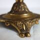 Pair of cherub candle holders in gilded bronze, early 20th century.