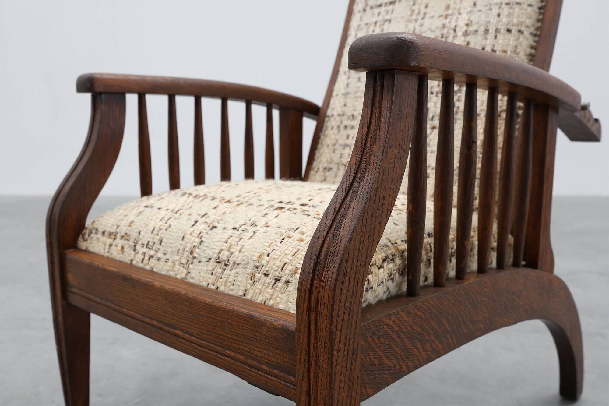 Arts & Craft oak armchair with spindle sides and tweed upholstery, Belgium