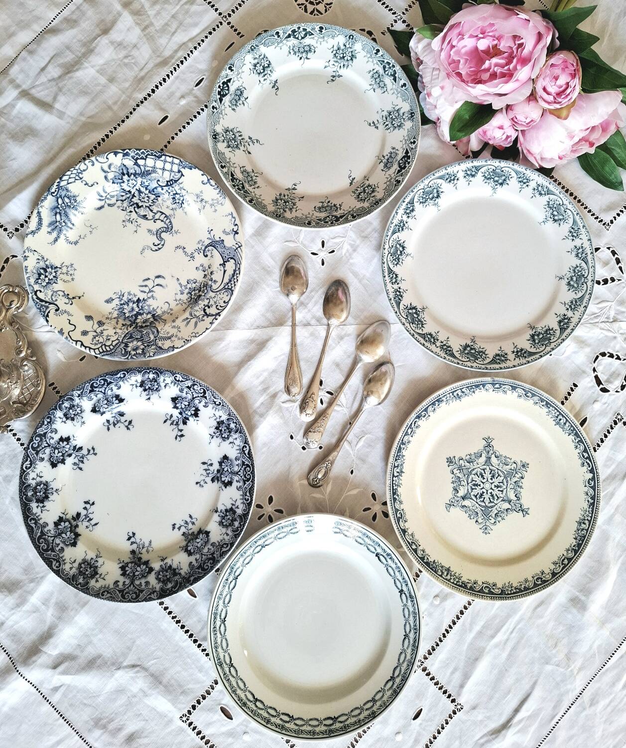 Antique earthenware dessert plates accompanied by a dish