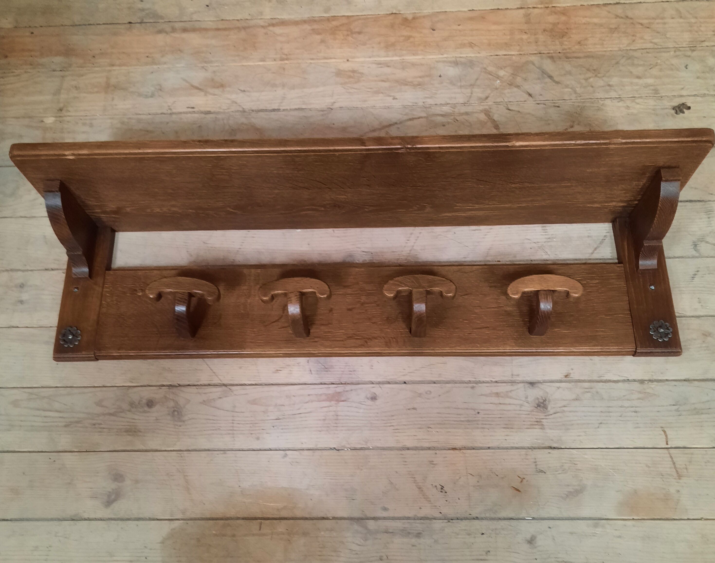 Wearing a brutalist style wooden wall coat