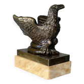 Eagle and serpent, bronze inkwell on a marble base.