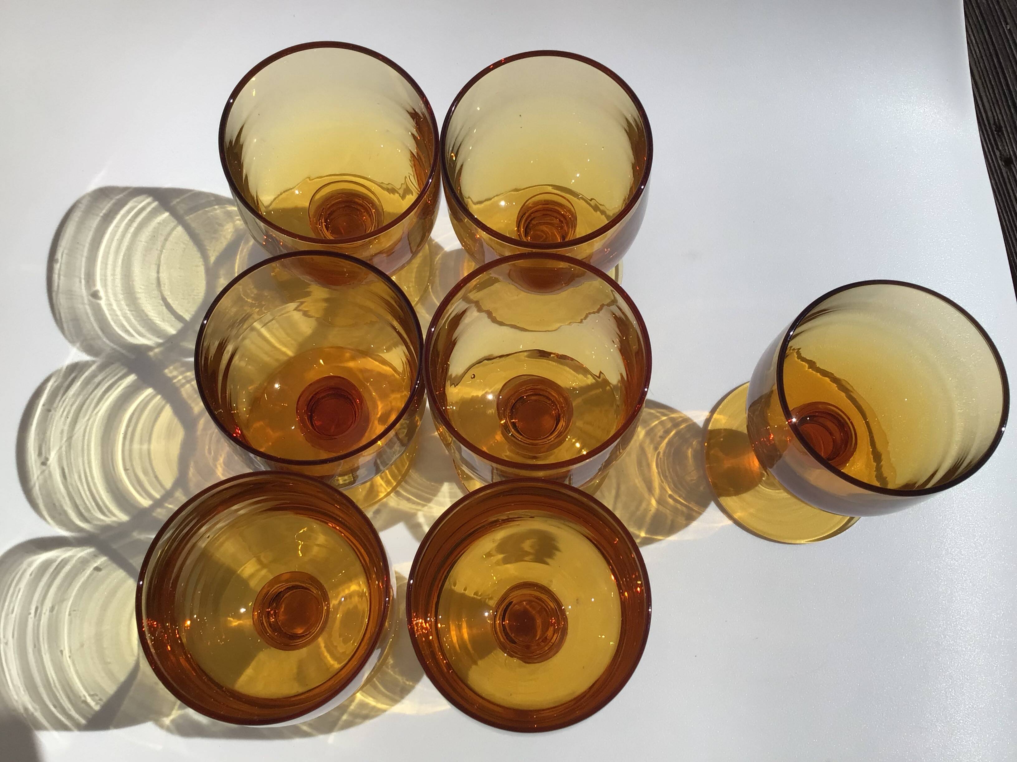 7 Amber stemmed glasses