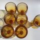 7 Amber stemmed glasses