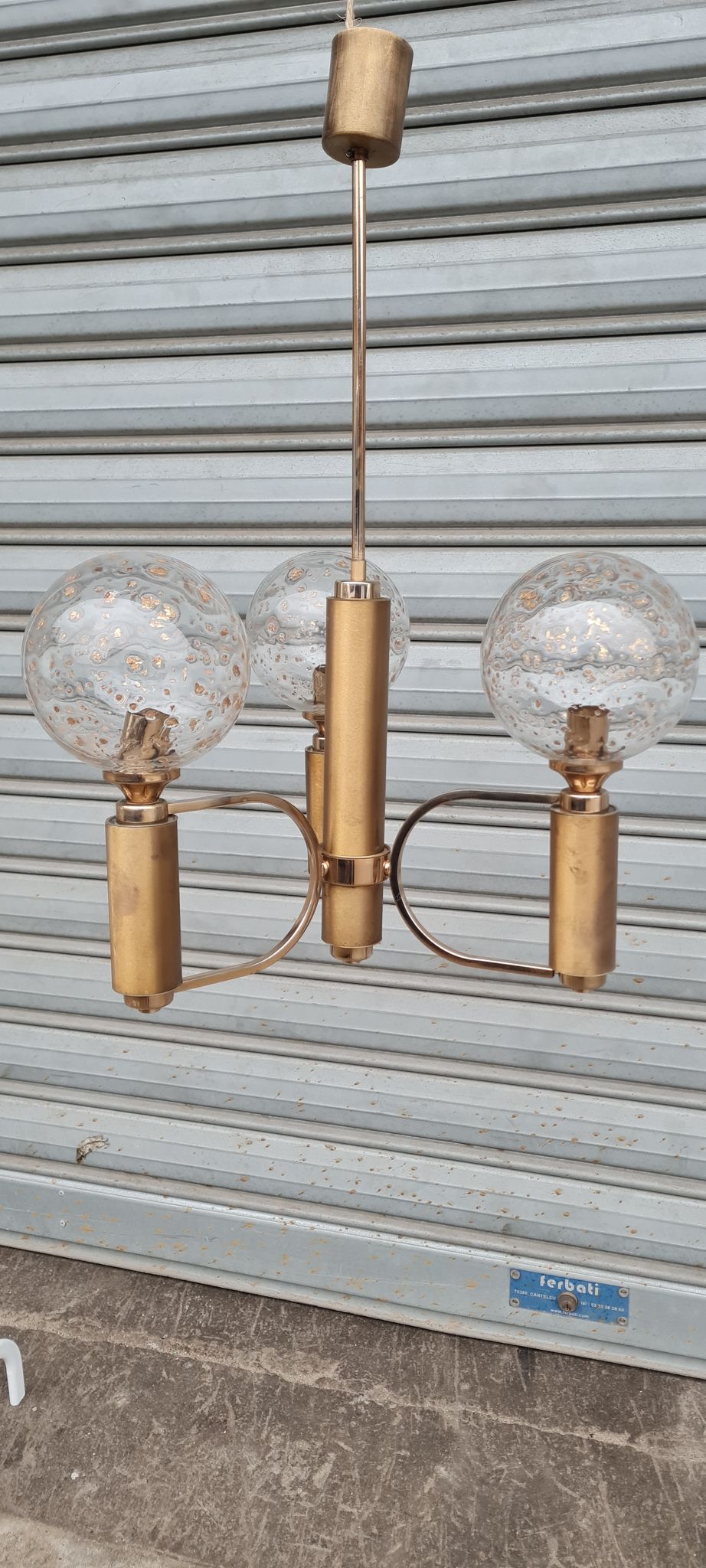 Brass and blown glass chandelier inlaid with gold