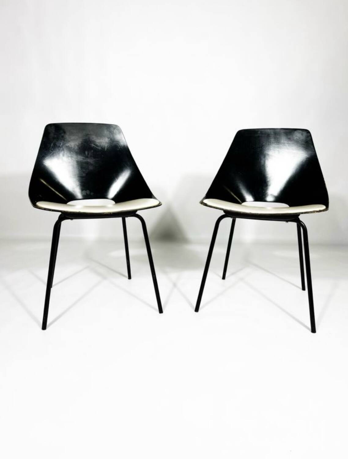 Tonneau chairs designed by Pierre Guairche for Steiner
