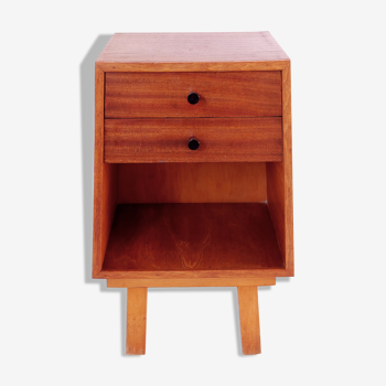 small extra cabinet or trapezoidal bedside