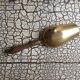 Old brass grocer's shovel or seed