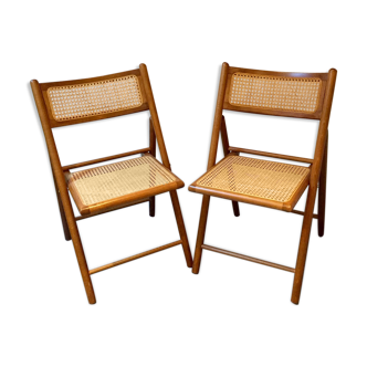 Two wooden folding chairs and vintage wicker canning
