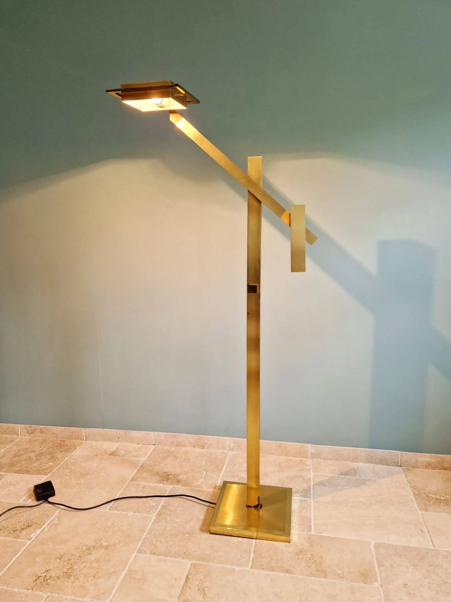 Brass articulated chandelier with counterweight, Hollywood Regency style, 1970-80.