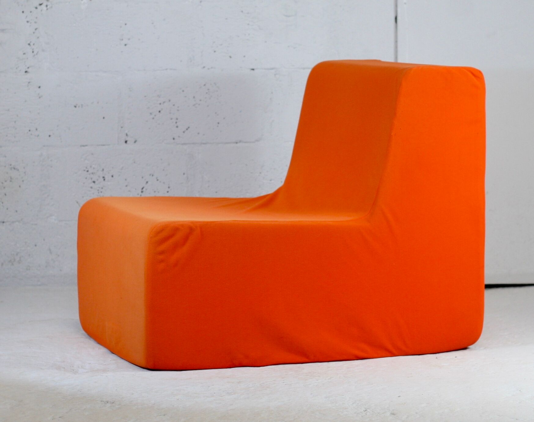 Armchair "space age" foam and orange jersey. Circa 1970