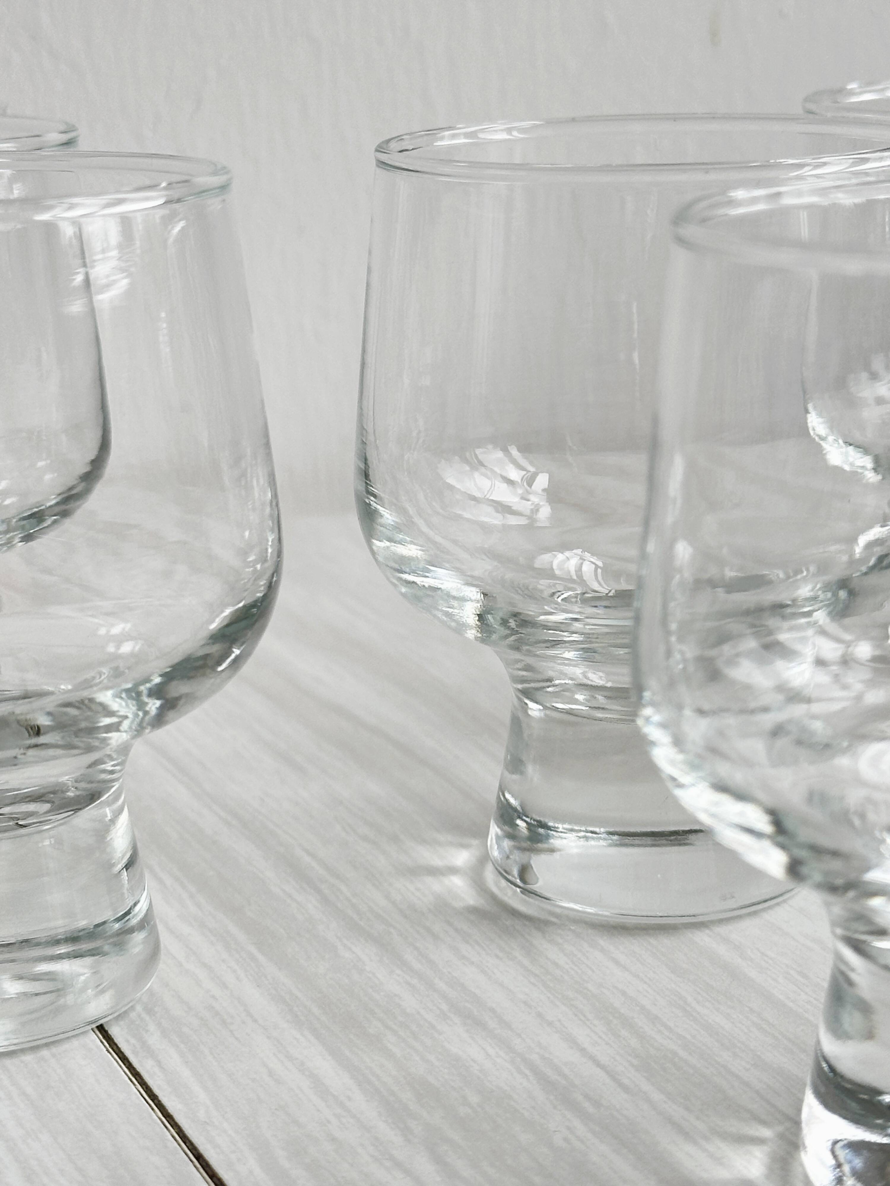 5 thick glass water glasses.