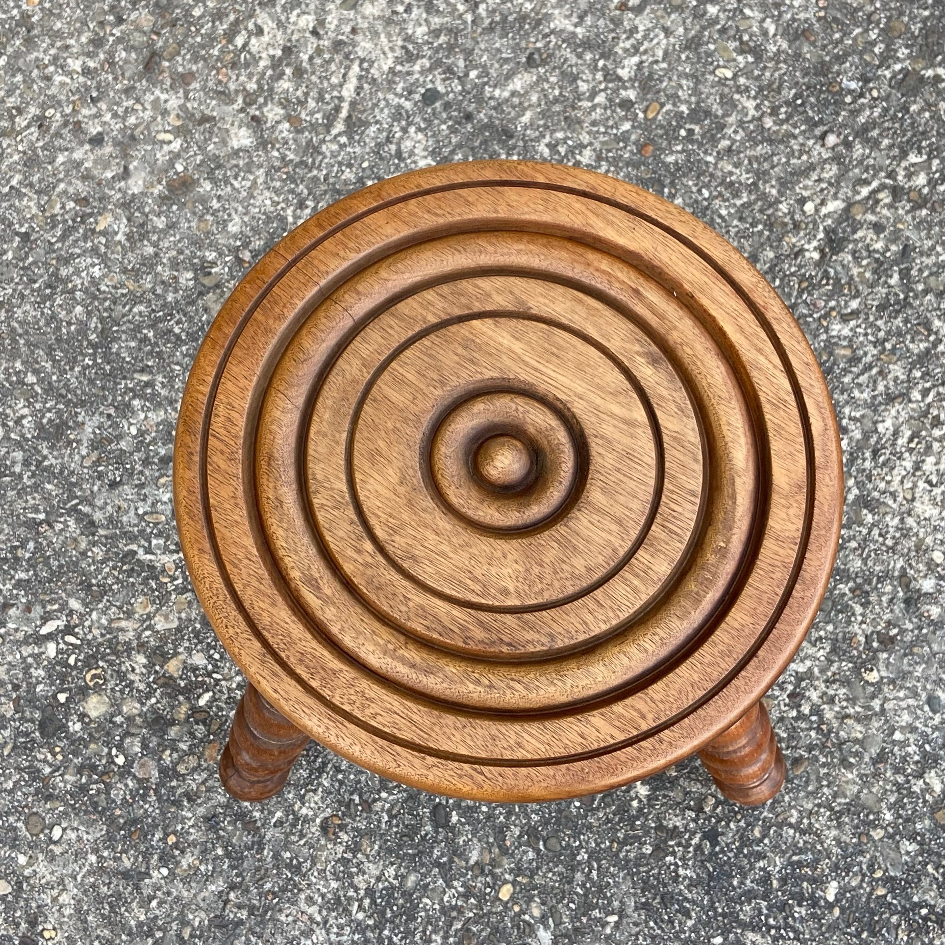 Turned wooden tripod stool