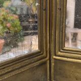 Old brass fireplace screen