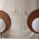 Designer wall lights in wood and opaline globe - mid-20th century