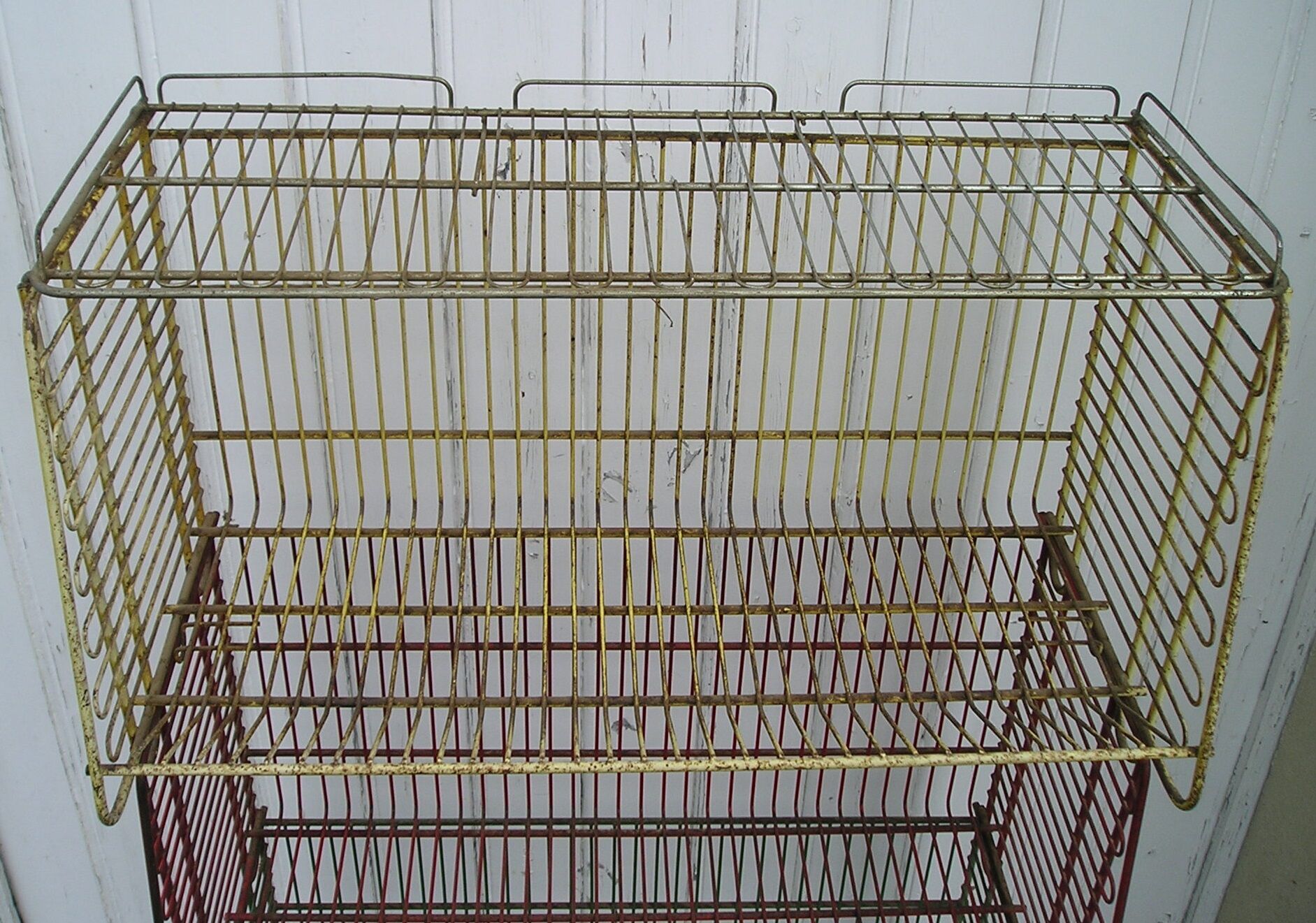 Metal display on wheels with 4 removable baskets 1960/70