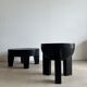 Black mango wood tripod side table with a semi-spherical top, height: 45 cm, diameter: 44 cm.
