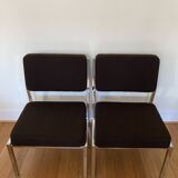 Pair of brown low chairs with chrome base