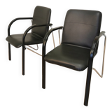 Set of 2 vintage office chairs in black leather chrome base plastic armrests / retro 1980s room