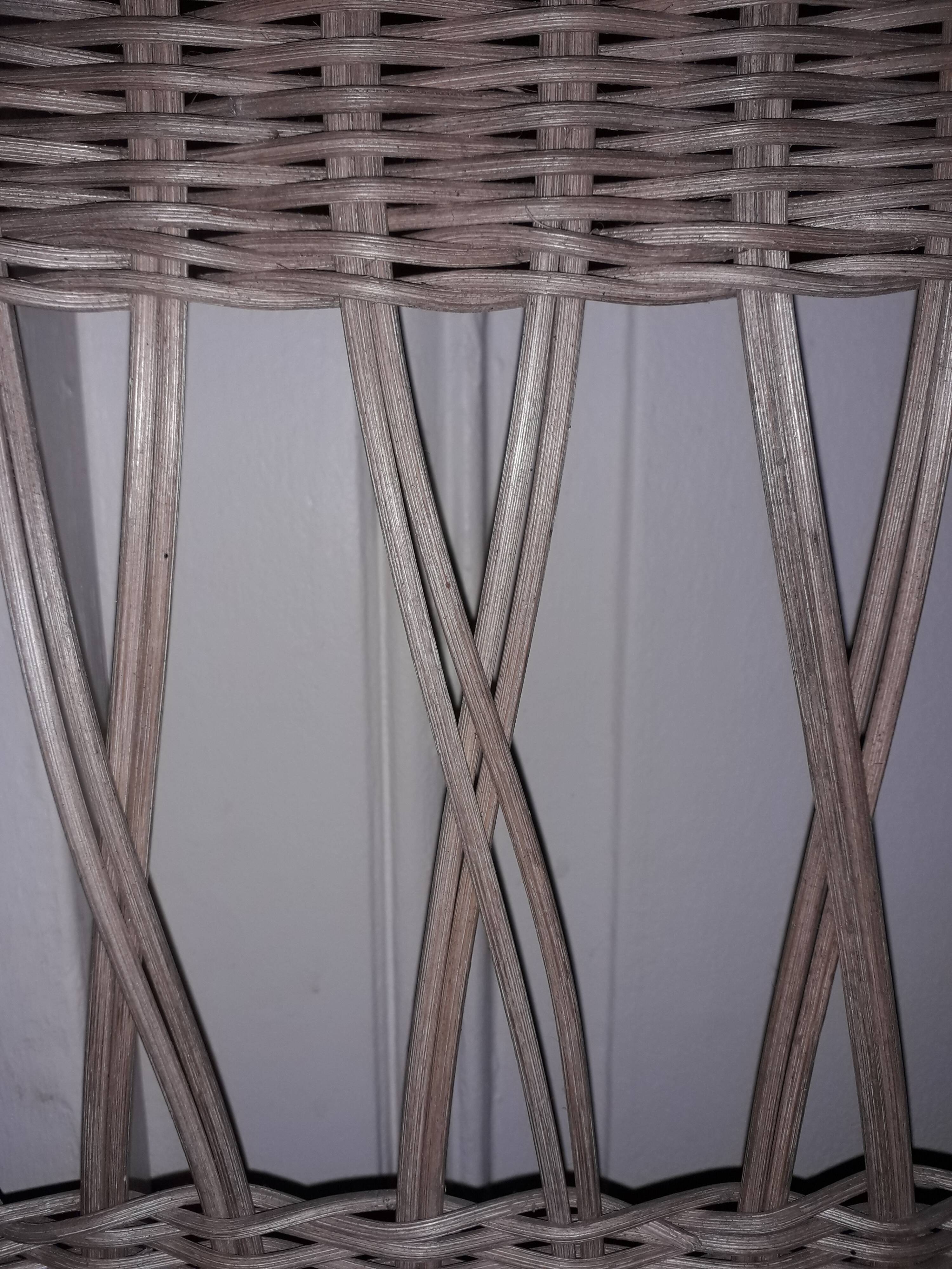 Metal and wicker coat holder