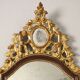 Neoclassical antique mirror in gilded wood, Italy, 18th century.