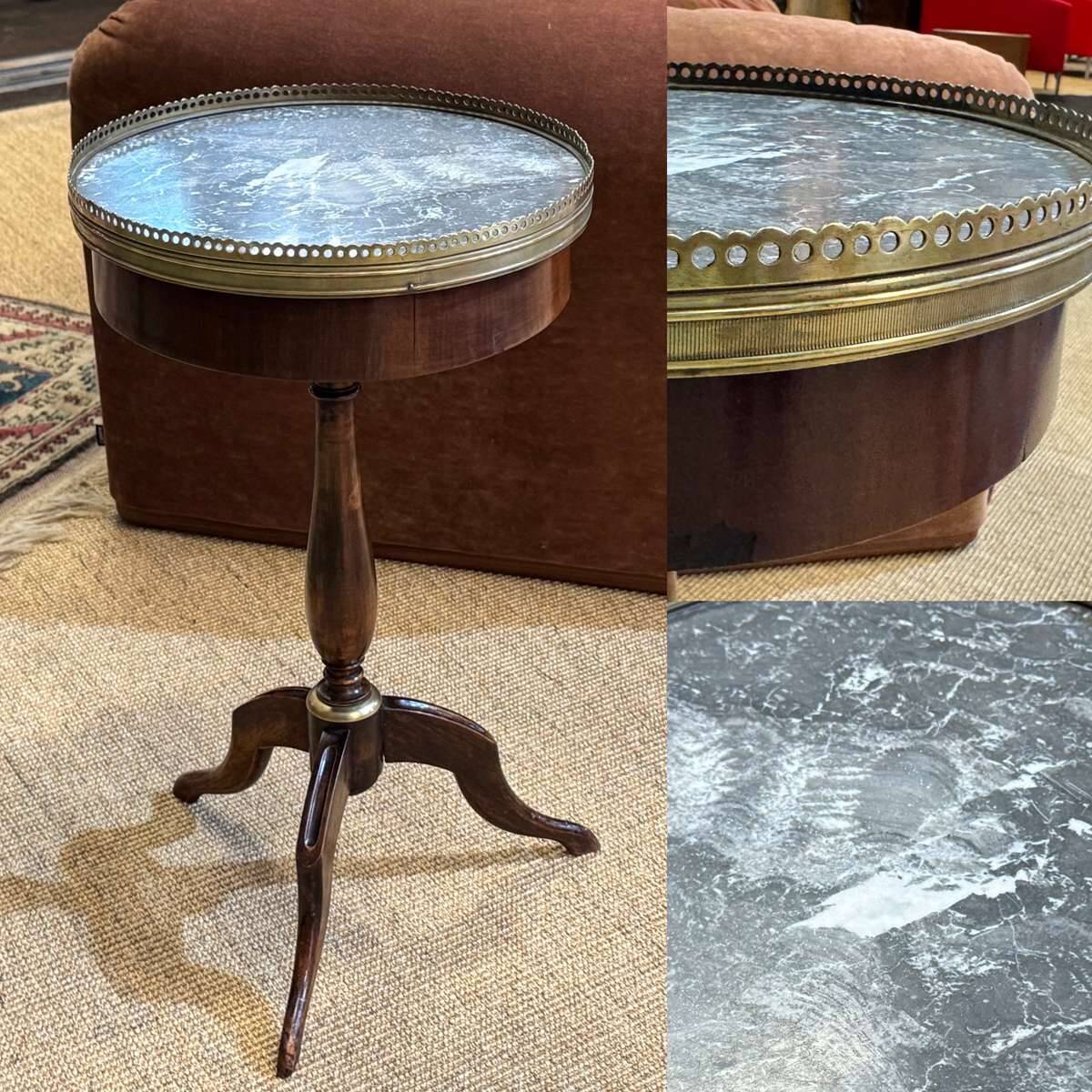 Mahogany gueridon with marble top from the 1950s.
