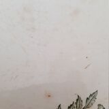 White and green ceramic dish decorated with flowers and butterflies