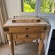 Genuine butcher's block made of solid wood with a knife drawer.