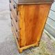 Small English chest of drawers with a folding top.