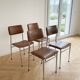 Set of 4 vintage 1970s brown faux leather chairs.