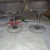 Beautiful set of seven crystal champagne glasses engraved with vine branches