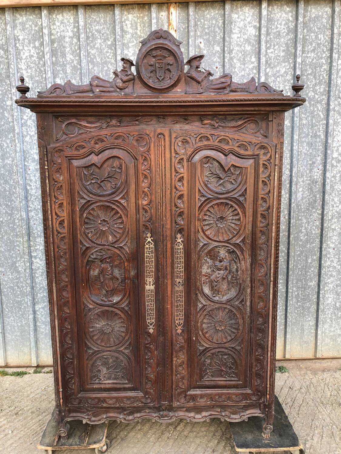 Antique Breton oak cabinet, richly carved