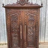 Armoire bretonne ancienne en chêne sculpté