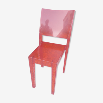 Orange design chair in polycarbonate plexiglass