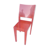 Orange design chair in polycarbonate plexiglass