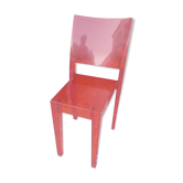 Orange design chair in polycarbonate plexiglass