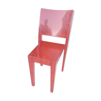 Orange design chair in polycarbonate plexiglass