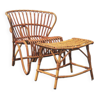 rattan armchair & footstool by furniture factory Jonkers