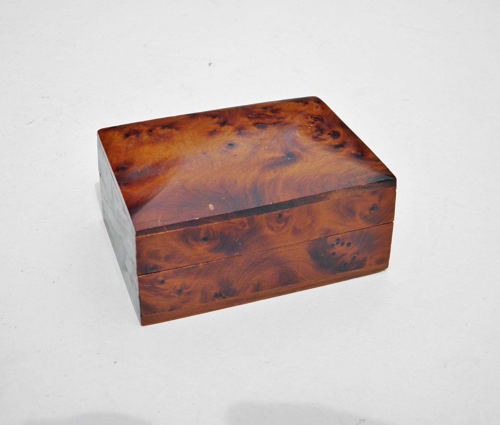 Three boxes in thuya magnifying glass