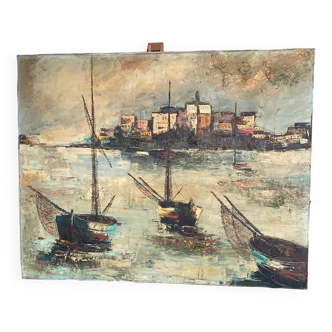 Marine oil on canvas 20th century fishing boats and village in the background