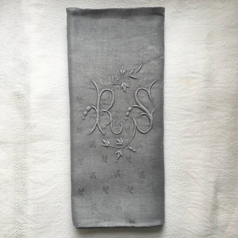 Old embroidered table napkin R S Grey